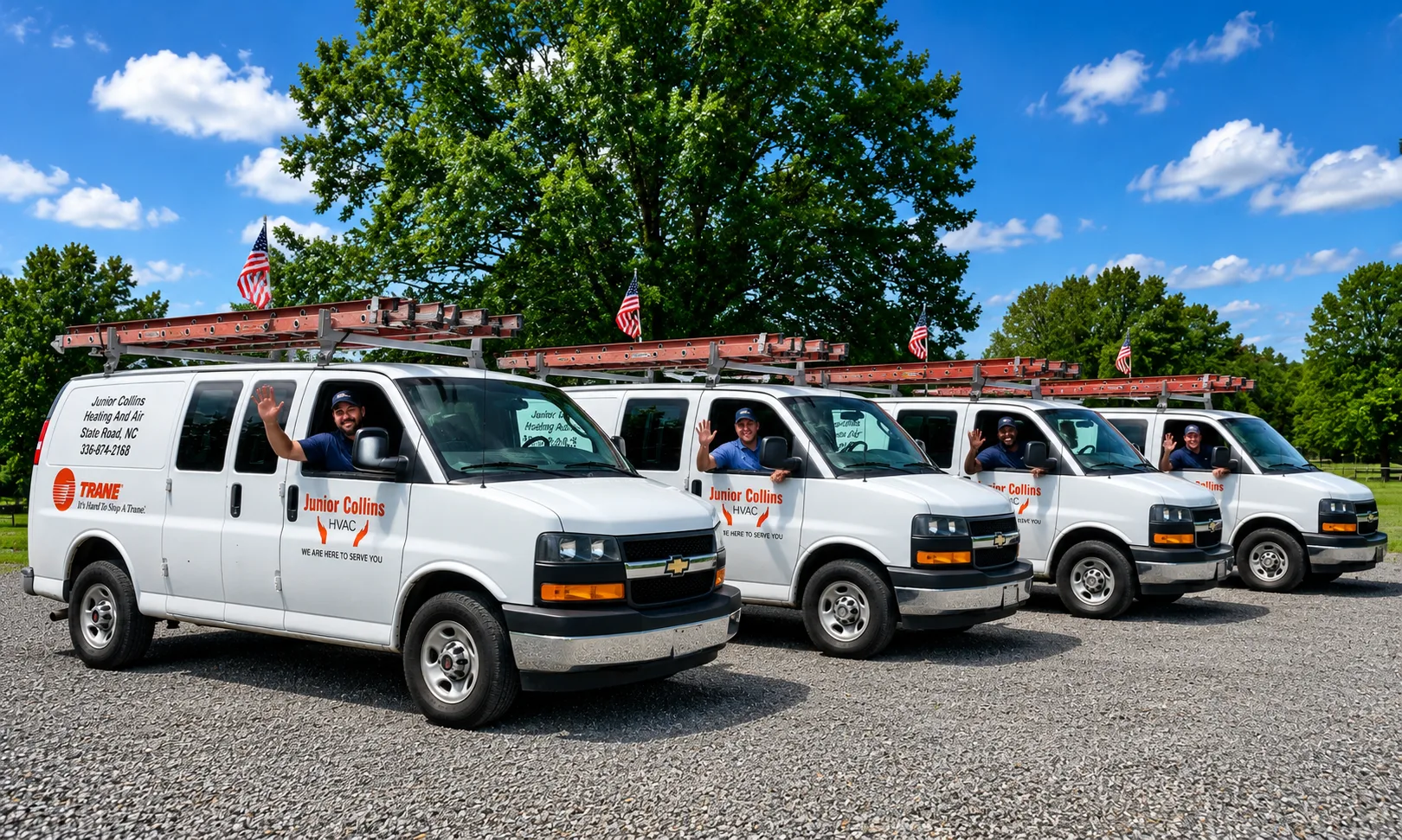 Junior Collins HVAC team waving from four Trane service vans — State Road, NC